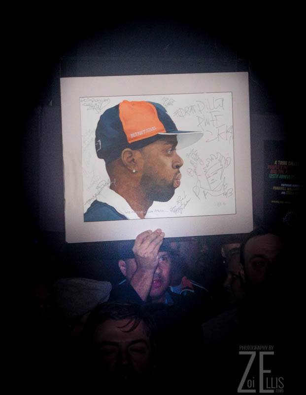 Malcolm was spotted by photographer Zoi Ellis. Here, he’s holding up my J Dilla painting during the show.